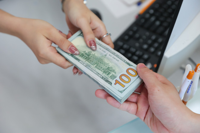 UOB dự báo tỷ giá USD/VND là 24.500 đồng/USD trong quý 4/2023. (Ảnh: PV/Vietnam+) UOB: Ngân hàng Nhà nước Việt Nam có thể sẽ cắt giảm thêm lãi suất ảnh 3