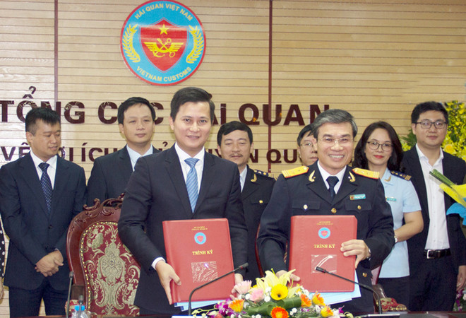 Năm ngân hàng ký thí điểm triển khai nộp thuế điện tử 24/7 ảnh 1