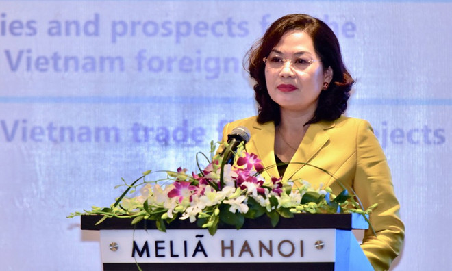 Phó Thống đốc Ngân hàng Nhà nước Nguyễn Thị Hồng phát biểu tại diễn đàn. (Ảnh: CTV/Vietnam+) Diễn đàn IBEC: Tăng cường hợp tác thương mại giữa Việt Nam và thế giới ảnh 1