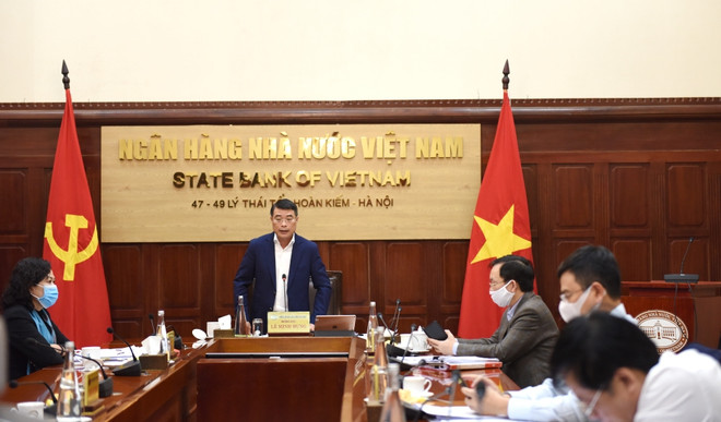 Thống đốc Ngân hàng Nhà nước Lê Minh Hưng chỉ đạo tại Hội nghị trực tuyến. (Ảnh: CTV/Vietnam+) Thống đốc: Các ngân hàng cần chia sẻ tối đa khó khăn với doanh nghiệp ảnh 1