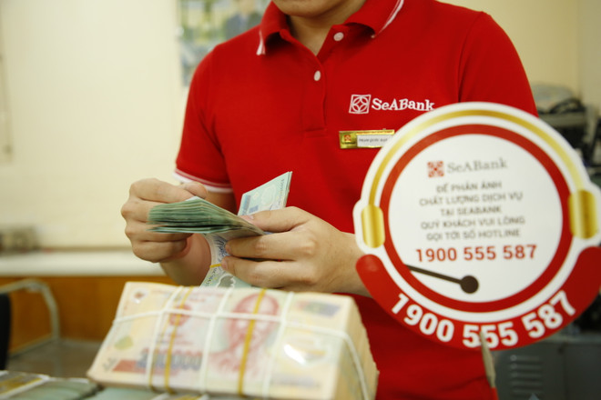 Lãi suất điều hành giảm tác động thế nào tới mặt bằng lãi vay? ảnh 1