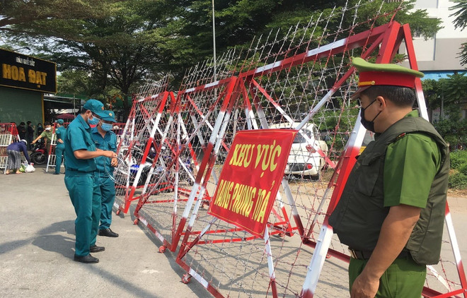 (Ảnh: TTXVN) Sáng 30 Tết, Việt Nam có tổng cộng 1.215 ca mắc COVID-19 ảnh 1