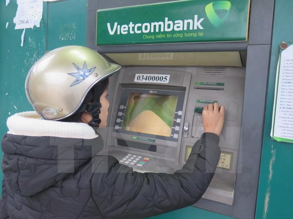 Nâng hạn mức rút tiền lên 5 triệu đồng, máy ATM hoạt động 24/7 ảnh 1