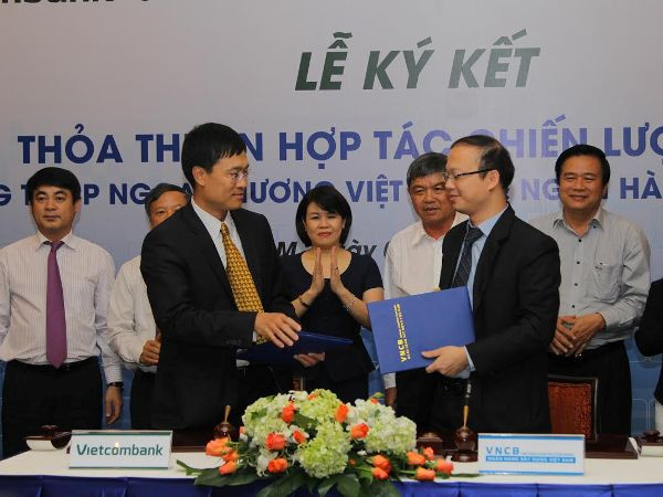 Vietcombank hỗ trợ vốn cho Ngân hàng Xây dựng Việt Nam ảnh 1