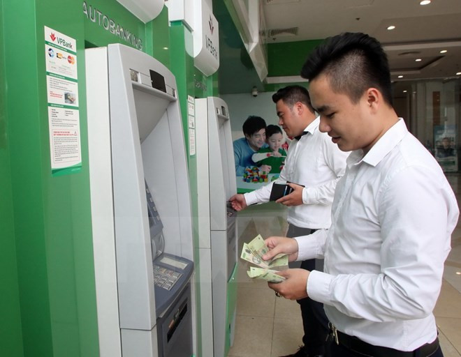 Các ngân hàng thương mại chưa được phép tăng phí ATM ảnh 1