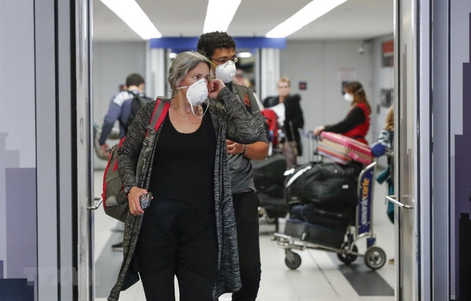 Một loạt các bang của Mỹ ra lệnh người dân ở nhà vì COVID-19 ảnh 1