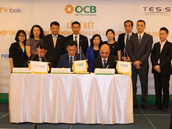 Lãnh đạo các bên tham gia ký kết. (Nguồn: OCB) OCB triển khai dự án công nghệ phòng chống hoạt động rửa tiền ảnh 1