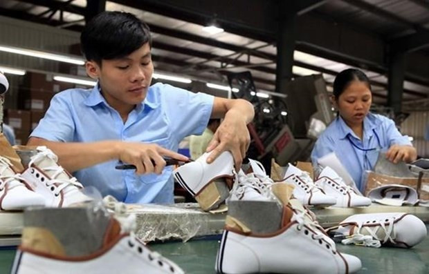 (Ảnh minh họa: Trần Việt/TTXVN) Tăng lương tối thiểu vùng từ 1/1/2020 với người theo hợp đồng lao động ảnh 1
