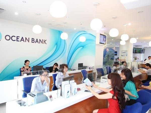 Giao dịch tại OceanBank. Ngân hàng Nhà nước báo cáo Quốc hội về sở hữu chéo và tái cơ cấu ảnh 1