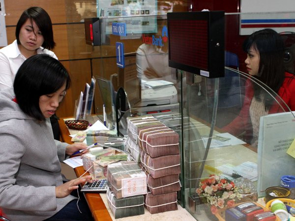 Sau hai năm, nhìn lại chính sách tiền tệ của Việt Nam ảnh 1