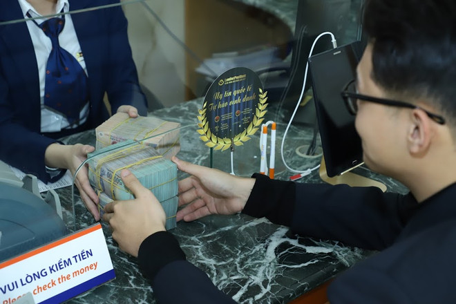 Ảnh minh họa. (Ảnh: CTV/Vietnam+) LienVietPostBank ưu đãi lớn về dịch vụ chuyển tiền quốc tế ảnh 1
