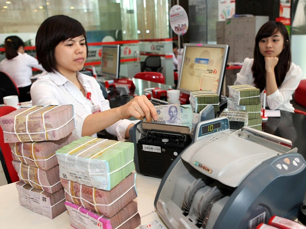 Ảnh minh họa. (Nguồn: TTXVN) Chuyên gia hiến kế giải quyết nhanh nút thắt về nợ xấu ảnh 1