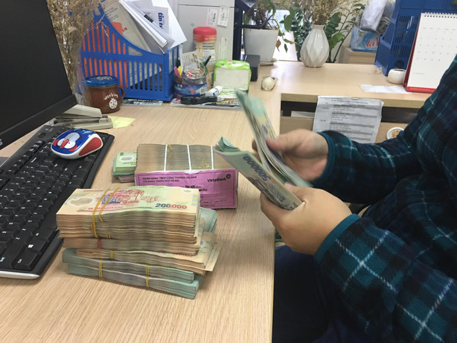 Lãi suất huy động tăng: 'Kìm' lãi suất cho vay thế nào? ảnh 1