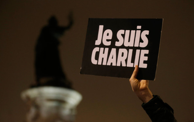 Truyền thông Pháp ủng hộ tờ báo trào phúng Charlie Hebdo ảnh 1