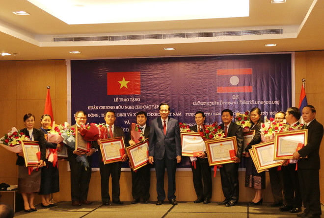 Đẩy mạnh hợp tác lao động và phúc lợi xã hội Việt Nam - Lào ảnh 1