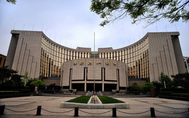 Quang cảnh bên ngoài Ngân hàng Nhân dân Trung Quốc. (Ảnh: Bitcoinist) Trung Quốc bơm 14,33 tỷ USD vào thị trường tài chính ảnh 1