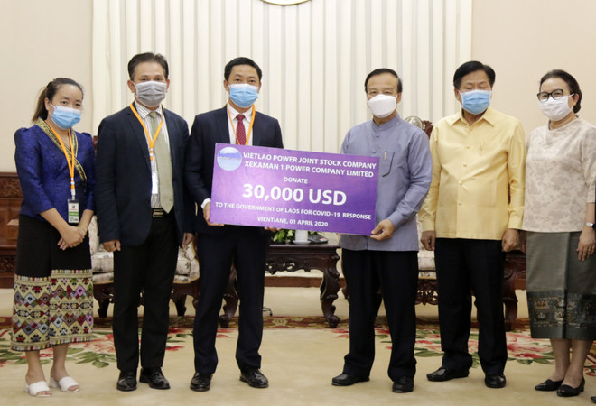 Doanh nghiệp Việt Nam chung tay cùng Lào chống COVID-19 ảnh 1