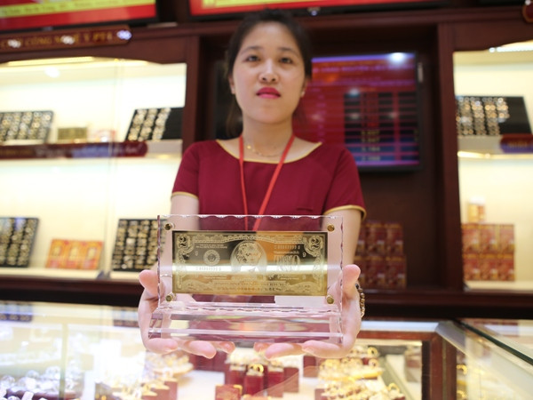 Giá vàng SJC và Bảo tín Minh Châu tăng giảm ngược chiều nhau ảnh 1