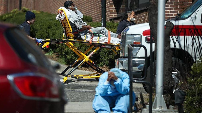 Dịch bệnh COVID-19 'âm ỉ' trên khắp nước Mỹ khi mùa cúm tới ảnh 1