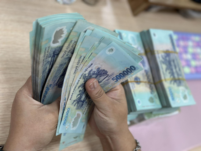 Tăng trưởng tín dụng đã nhích nhẹ. (Ảnh: PV/Vietnam+) WB: Sản xuất công nghiệp và tăng trưởng tín dụng "nhích" nhẹ ảnh 3