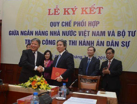 Bộ Tư pháp và Ngân hàng Nhà nước phối hợp xử lý nợ xấu ảnh 1