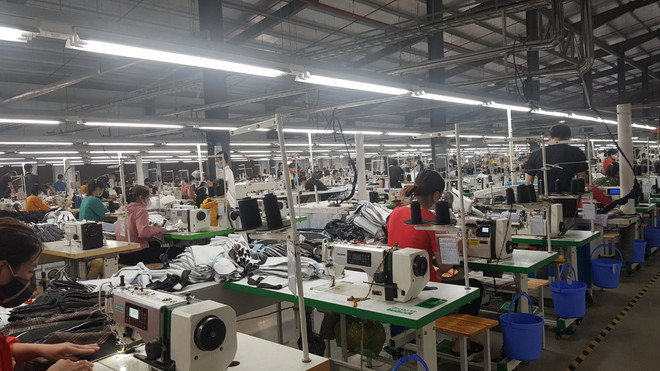 Nhiều doanh nghiệp lo sợ lãi suất cho vay “quay đầu” tăng. (Ảnh: Vietnam+) vnp_Tien son TH1.jpg