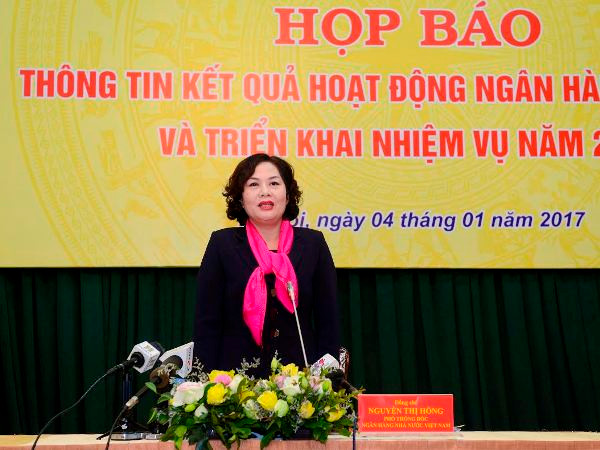 "Sẽ cố gắng giảm lãi suất cho vay ở một số lĩnh vực trong năm 2017" ảnh 1