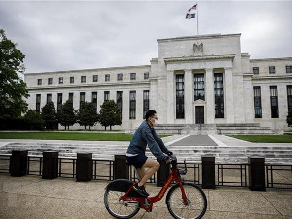 Fed thông báo giữ nguyên lãi suất bất chấp tác động của COVID-19 ảnh 1