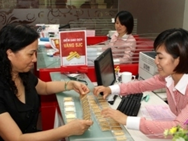 Giá vàng SJC đi ngang, tỷ giá giảm từ 5-10 đồng/USD ảnh 1