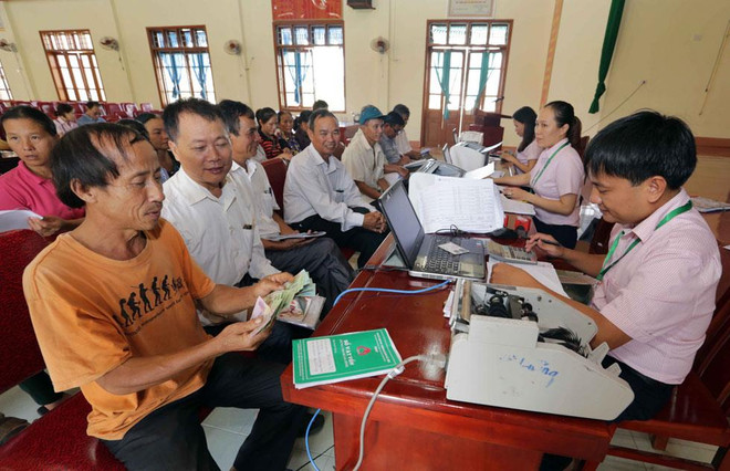 Ngân hàng Chính sách tỉnh Nghệ An giao dịch tại điểm giao dịch xã. (Ảnh: CTV) Chỉ thị số 40: Tạo đột phá trong tín dụng chính sách ở Nghệ An ảnh 1