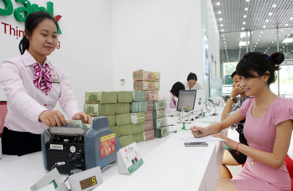Sau khi giảm giá xuống 21.250 đồng, VND đã ổn định xung quanh mức bình quân mới (Nguồn: TTXVN). HSBC: Đồng tiền Việt Nam ổn định trong hiện tại ảnh 1