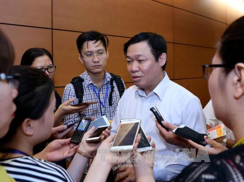 Phó Thủ tướng: Trần nợ công dứt khoát phải khống chế không quá 65% GDP ảnh 1