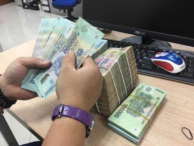 Ảnh minh họa. (Ảnh: T.H/Vietnam+) Ngân hàng Nhà nước trả lời về 3 ngân hàng 0 đồng, sổ tiết kiệm bốc hơi ảnh 1