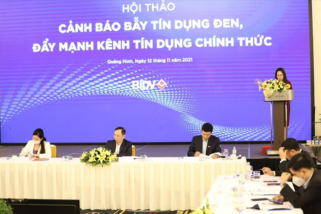 Quang cảnh hội thảo. (Ảnh: CTV/Vietnam+) Kiên quyết dẹp bỏ tệ nạn tín dụng đen, cho vay nặng lãi ảnh 1