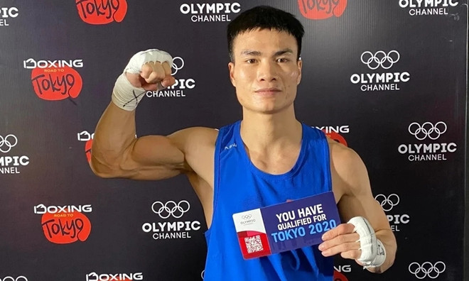 Vận động viên Nguyễn Văn Đương giúp môn boxing Việt Nam có vé dự Thế vận hội Olympic sau 32 năm chờ đợi. Thể thao Việt Nam hứa hẹn sẽ bùng nổ trong năm Tân Sửu ảnh 2