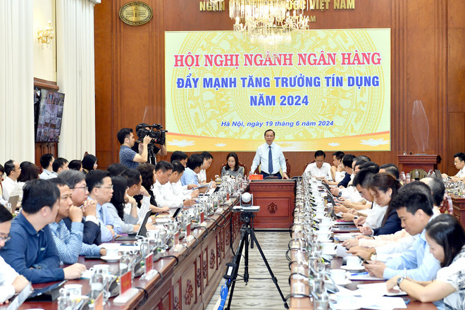 Phó Thống đốc Ngân hàng Nhà nước Đào Minh Tú phát biểu tại hội nghị. (Ảnh: Vietnam+) z5552918492765_b6ca21993849da213a30e348f8f5850d.jpg