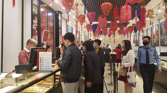 Vàng SJC giao dịch ở mức 48,5 triệu đồng, tỷ giá trung tâm tăng nhẹ ảnh 1