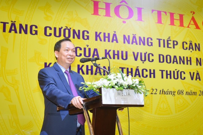 Phó Thống đốc Thường trực Ngân hàng Nhà nước Đào Minh Tú phát biểu tại hội thảo. (Ảnh: PV/Vietnam+) Phó Thống đốc: Khôi phục sức khỏe của doanh nghiệp là ưu tiên hàng đầu ảnh 1