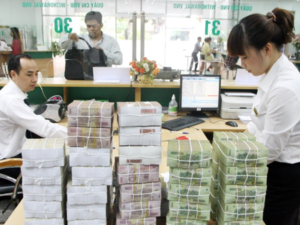 Ảnh minh họa. (Nguồn: TTXVN) Sau Vietin Bank, BIDV tiếp tục đề nghị được giữ cổ tức để tăng vốn ảnh 1