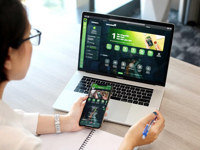 Từ 1/1/2022, khách hàng chuyển khoản nội và ngoại mạng được miễn phí trên VCB Digibank. (Ảnh: Vietnam+) Vietcombank miễn toàn bộ phí duy trì và chuyển tiền trên VCB Digibank ảnh 1