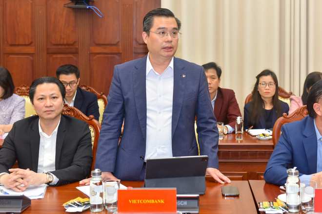 Ông Nguyễn Thanh Tùng, Tổng giám đốc Vietcombank phát biểu tại hội nghị. (Ảnh: PV/Vietnam+) z5175979276791_f0b66fd9235b9ce308bf67e4f1fb5408.jpg