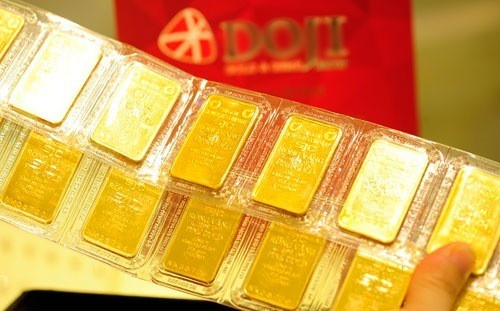 Ngân hàng Nhà nước sửa quy định hướng dẫn mua, bán vàng miếng. (Ảnh: PV/Vietnam+) Ngân hàng Nhà nước sửa quy định hướng dẫn mua, bán vàng miếng ảnh 1