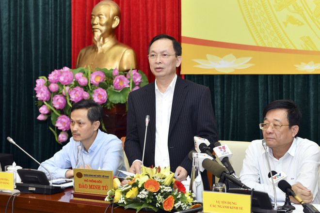 Phó Thống đốc Đào Minh Tú phát biểu tại buổi gặp gỡ. (Ảnh: CTV/Vietnam+) COVID-19: Các ngân hàng được quyền chủ động cơ cấu lại nợ ảnh 2