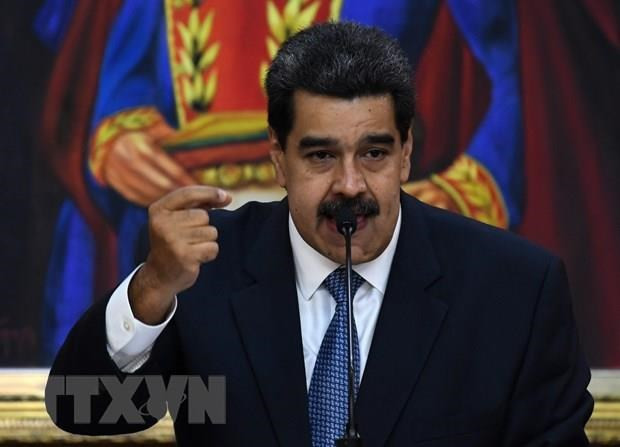 Tổng thống Venezuela Nicolas Maduro. (Nguồn: AFP/TTXVN) Giao dịch ngoại tệ đang là 'van an toàn' cho nền kinh tế Venezuela ảnh 1