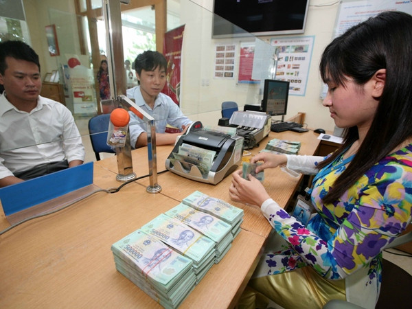 Ảnh minh họa. (Nguồn: TTXVN). Đến cuối tháng Chín, nợ xấu đã được giảm về mức 3,88% ảnh 1