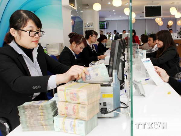 Nhiều đại biểu Quốc hội cho rằng, lãi suất cho vay hiện còn khá cao. (Nguồn: TTXVN). "Doanh nghiệp bị làm khó vì lãi suất cho vay trung, dài hạn quá cao" ảnh 1