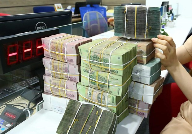 Ảnh minh họa. (Nguồn: TTXVN) Ngân hàng Nhà nước sẽ nghiêm khắc với sở hữu chéo, cho vay BOT ảnh 1