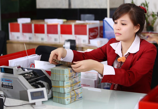 Ảnh minh họa. (Ảnh: Vietnam+) Gói cấp bù lãi suất cho doanh nghiệp: Cần phải đến đúng đối tượng ảnh 1