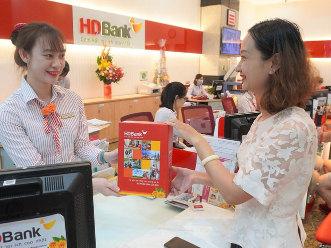 Ngân hàng dành nhiều ưu đãi lớn cho khách hàng nữ nhân dịp 8/3 ảnh 1