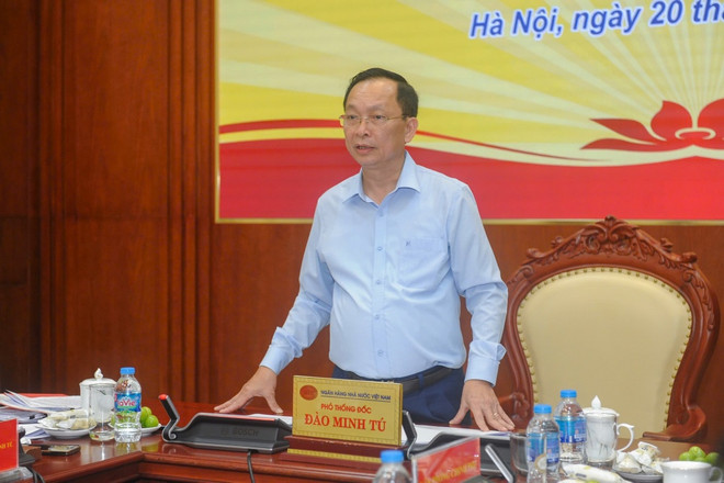 Phó Thống đốc Đào Minh Tú phát biểu tại hội nghị. (Ảnh: Vietnam+) o tu.jpg